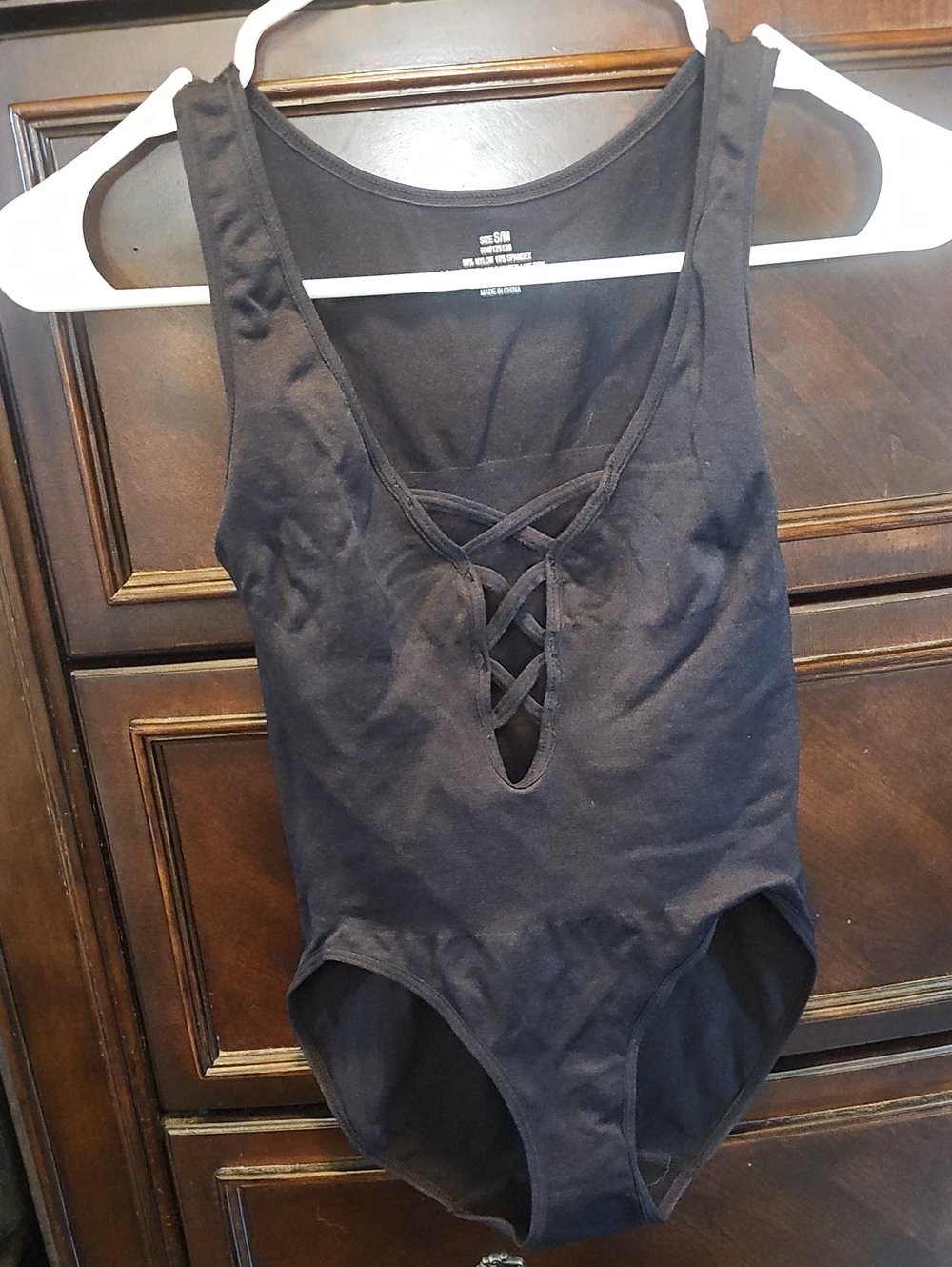 Women's Black Lace-Up One-Piece Bodysuit